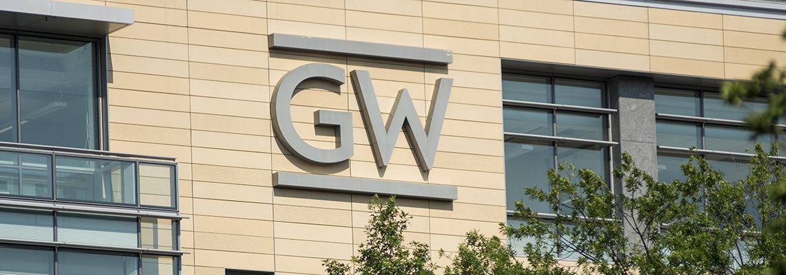 GW logo on the side of a building