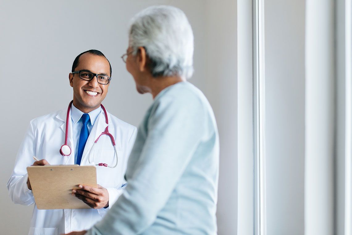 Doctor speaking to a patient