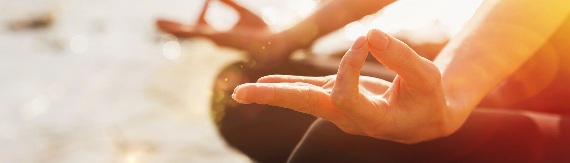 Close up of hands in a meditation pose